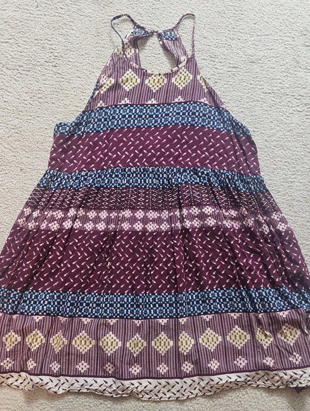 Hem & Thread halter-neck mini dress or top featuring a tiered, bohemian-style